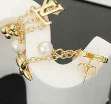 Load image into Gallery viewer, Logo Earrings
