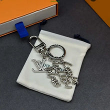 Load image into Gallery viewer, Logo Bag Charm/Keychain
