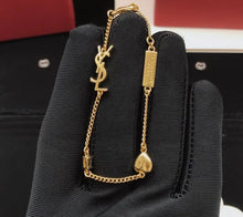Load image into Gallery viewer, Logo Bracelet
