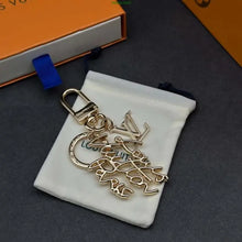 Load image into Gallery viewer, Logo Bag Charm/Keychain

