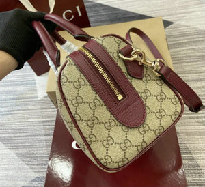 Ophidia Top Handle Bag