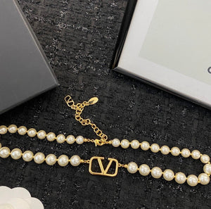 V Logo Pearl